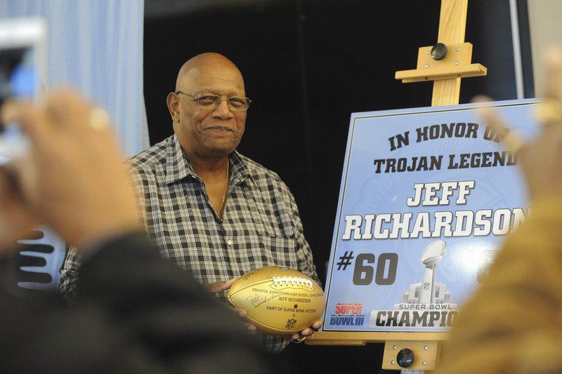 Jeff Richardson presents Super Bowl golden football